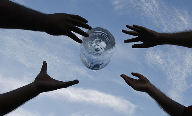 24 hours in pictures: Constitucion, Chile: Aid unloaded for people affected by the earthquake