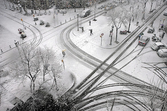 snow in barcelona: People walk on the Rambla de Catalunya