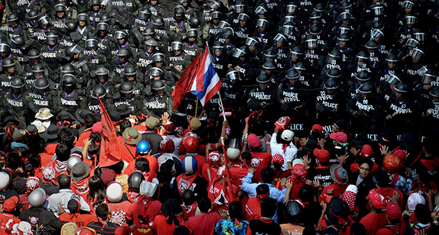 24 Hours in Pics: Red-shirted supporters of Thaksin Shinawatra clash with riot police
