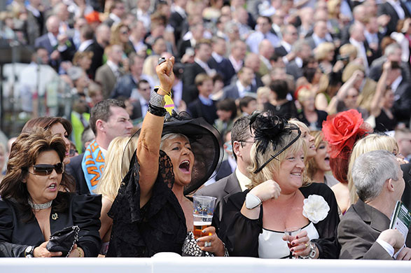 Grand National: A happy racegoer celebrates in the first race