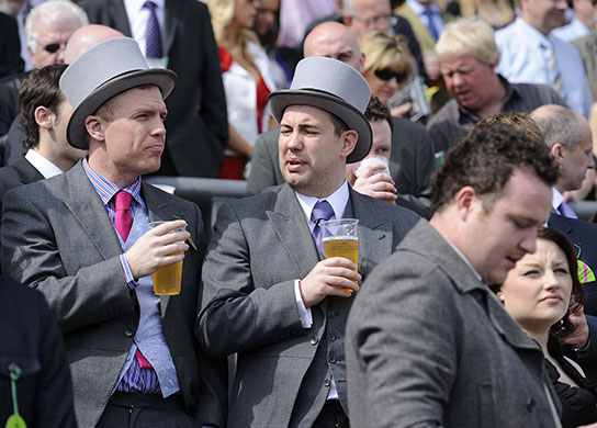 Grand National: These chaps may regret their choice of attire if the sun continues to shine