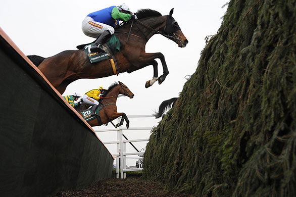 grand national: Jumping the ditch in front of The Chair