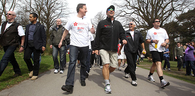 Election campaign: David Cameron joins Sir Ian Botham on his latest charity walk