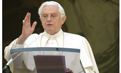 Pope Benedict XVI blesses during Sunday Angelus prayer at his 
residence of Castelgandolfo