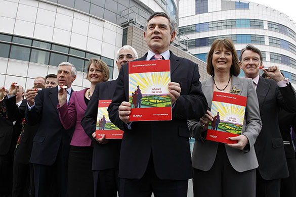 Election campaign week 2: Prime Minister Gordon Brown holds a copy of the Labour Manifesto