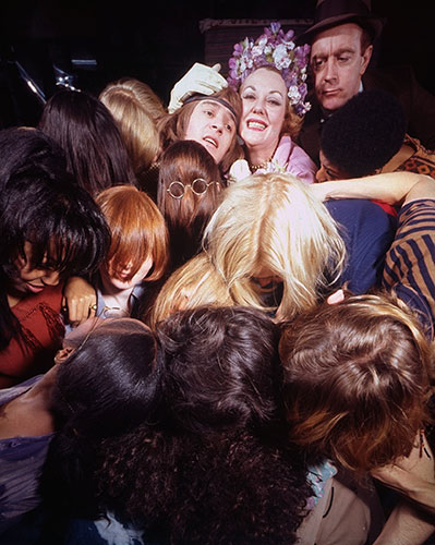 1968: Hair the muscial: Group of actors clustered together in sc