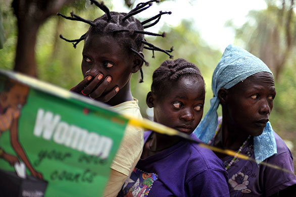 24 hours in pictures: Yambio, Sudan: Voters queue at a polling station