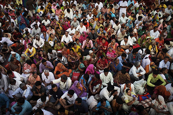 24 hours in pictures: Haridwar, India: Hindu devotees offer prayers on the banks of the Ganges