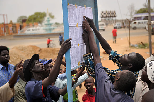 Sudan elections: Sudanese people search for their names on election lists