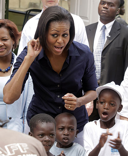 Michelle Obama in Haiti: Michelle Obama with children during her visit