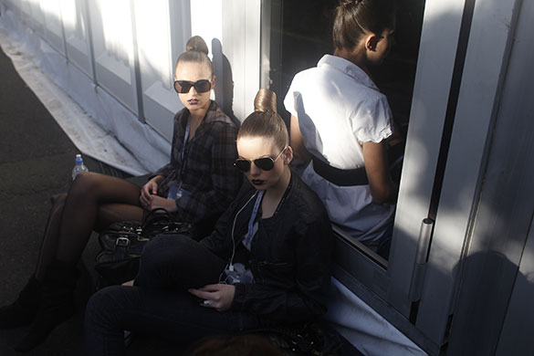 24 hours in pictures: Mexico City, Mexico: Models wait backstage during a fashion show