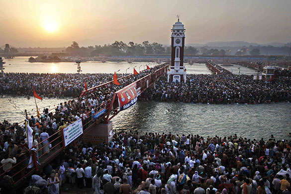 24 hours in pictures: Kumbh Mela festival 