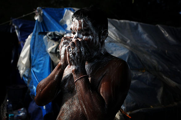 24 hours in pictures: Asylum Seekers At Merak Port Await Relocation