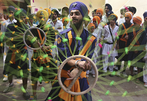 Sikh festivals: A Nihang or Sikh warrior performs Gatkha a traditional form of martial arts