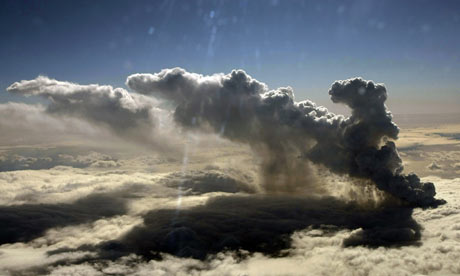 Smoke billows from an erupting volcano which seems to be close to the top of Eyjafjallajokull 