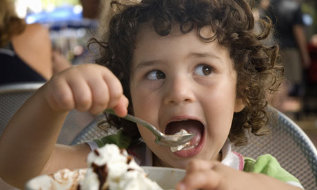 fat man eating ice cream. Child eating ice cream