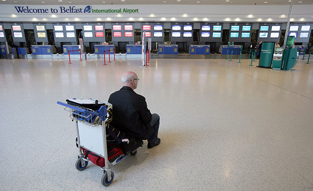 Volcano disruption: A solitary would-be flier at Belfast International Airport,