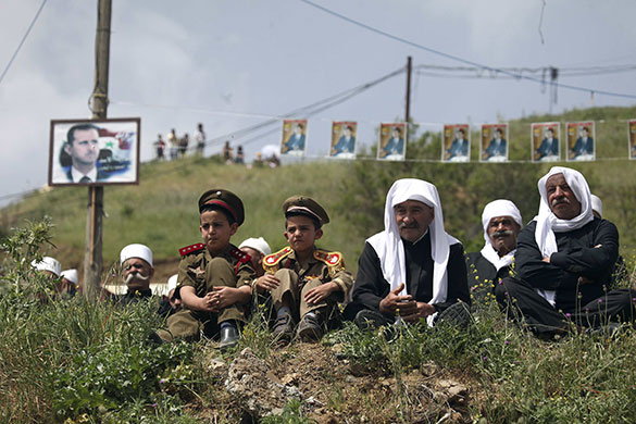 24 hours: Majdel Shams, Israel: Boys dressed in soldiers' uniforms