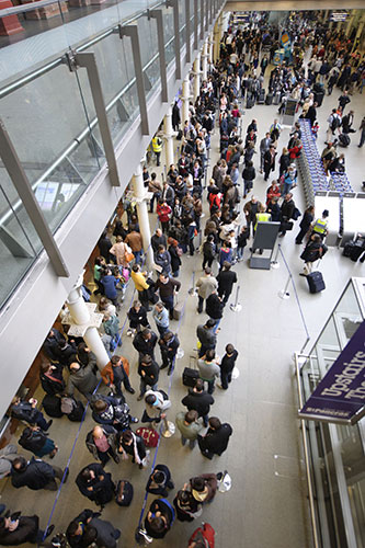 Travel chaos: Travellers queue for Eurostar tickets at Kings Cross St Pancras station