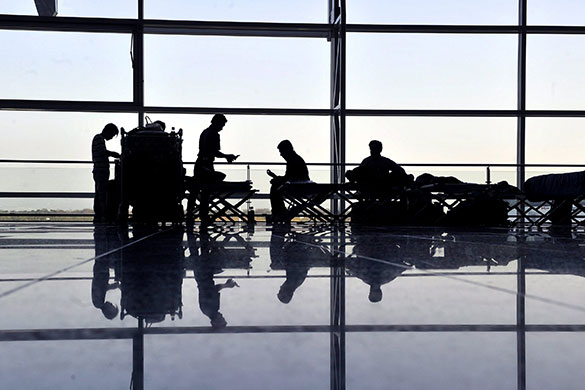 volcano travel chaos: Grounded passengers wait at the airport in Frankfurt