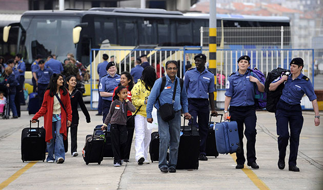 Stranded passengers: Royal Navy sailors help passengers stranded by cancellations at Santander