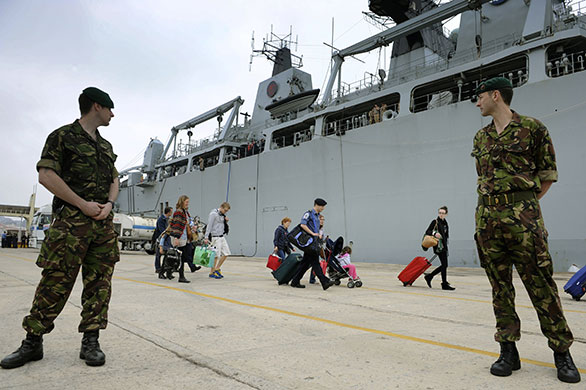 Stranded passengers: British civilians board HMS Albion Royal Navy ship destined for Portsmouth