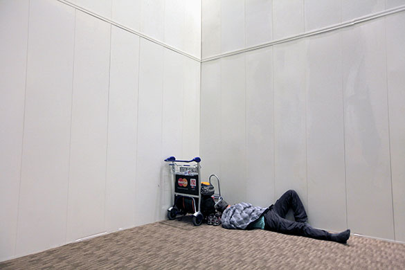 24 hours in pictures: Singapore: A stranded passenger at Changi International Airport