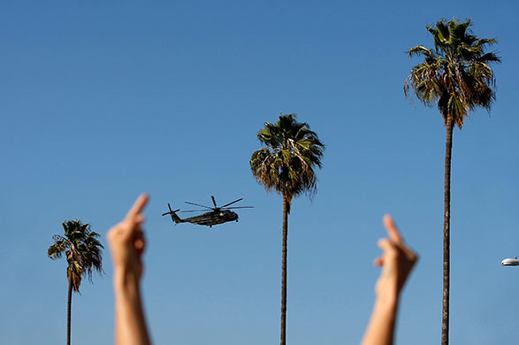 24 hours in pictures: anti-war activists demonstrate outside obama's appearance at dnc fundraiser