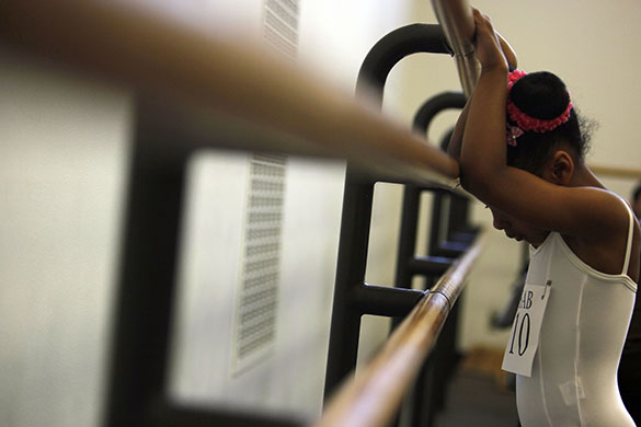 24 hours in pictures: New York, USA: A girl auditions for School of American Ballet