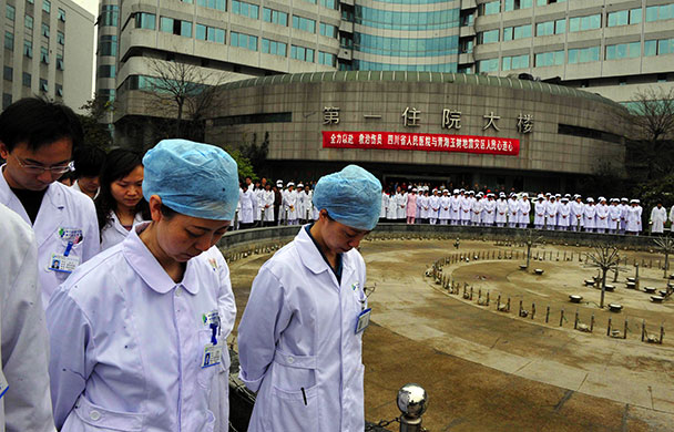 china quake mourning: Chengdu: Medical staff observe the silence in Sichuan province 