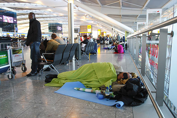Airspace reopens: Passengers continue to wait for their flights in Terminal 5 at Heathrow