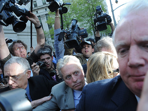 24 hours in pictures: New York, US: Michael Douglas exits Manhattan federal court 