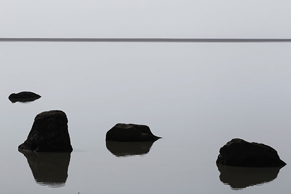 24 hours in pictures: Rocks are reflected in a lake in Iceland