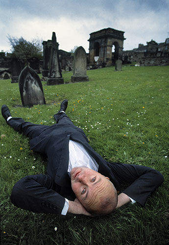Literary Edinburgh: Irvine Welsh poses in a cemetry in Edinburgh
