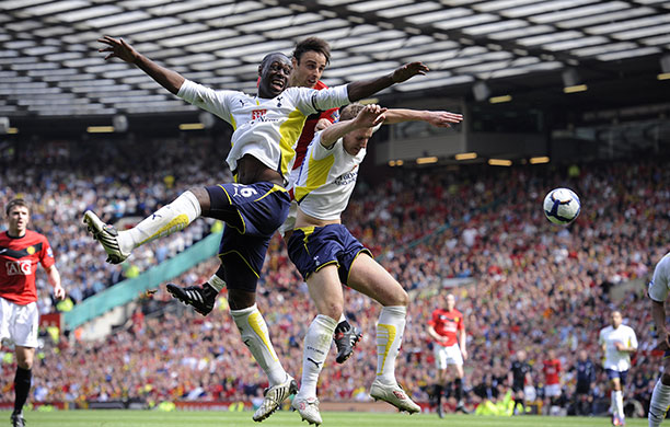 United v Spurs: Berbatov gets between King and Dawson to try a header at goal