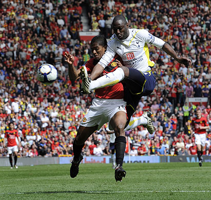United v Spurs: King manages to clear the ball before Valencia could get to it