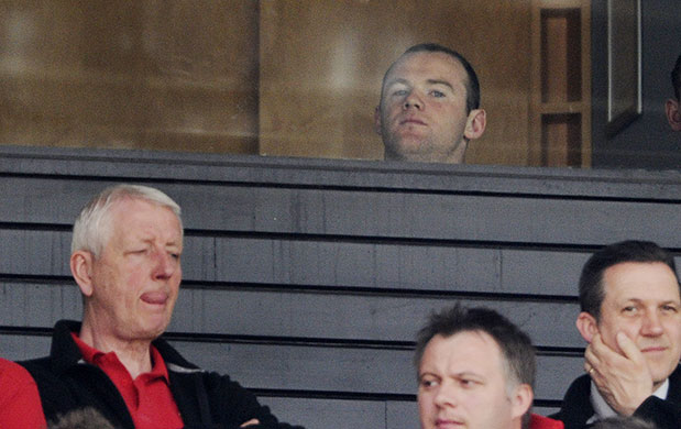 United v Spurs: Wayne Rooney watches the match