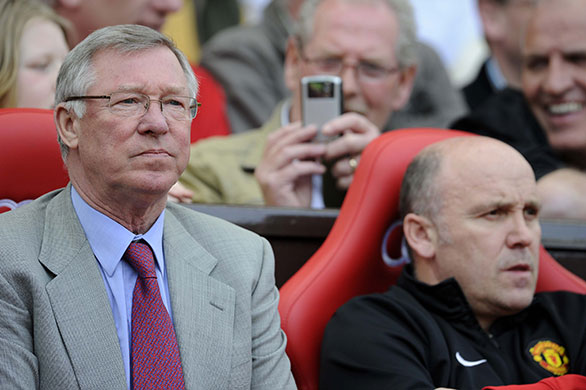 United v Spurs: A fan takes a photo of Fergie