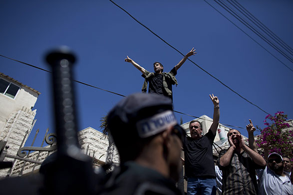 24 hours in pictures: Israeli Settlers March Through Palestinian Neighbourhood Of East Jerusalem