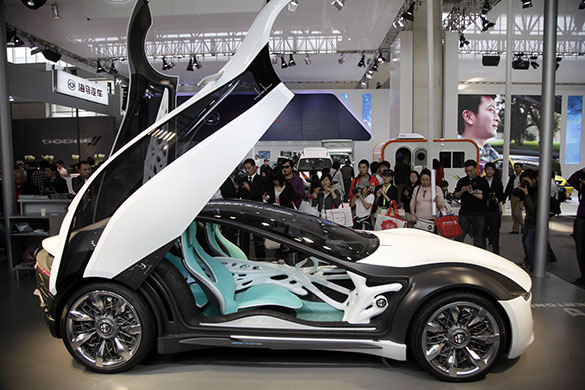 Beijing car show: Visitors take photos of Italy's Bertone Pandion futuristic concept car 