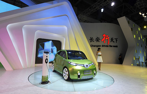 Beijing car show: A model stands next to Chinese car maker Chang'an's electronic-energy car 