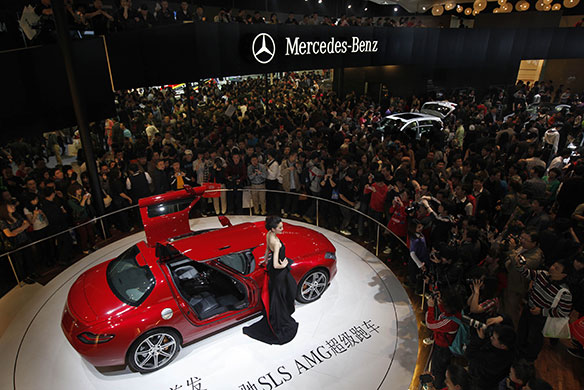 Beijing car show: Visitors gather around the new Mercedes-Benz SLS AMG 