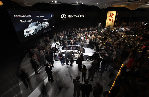 Beijing car show: Visitors gather around a Mercedes Benz new long version of the E-Class