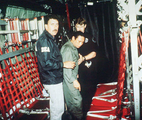 Manuel Noriega: January 4 1990: Noriega is escorted to a plane at Howard Air Force base