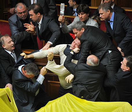Ukraine parliament: Deputies of Ukraine's parliament fight during a parliament sitting in Kiev