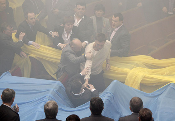 Ukraine parliament: Deputies scuffle during a session in the Ukrainian parliament