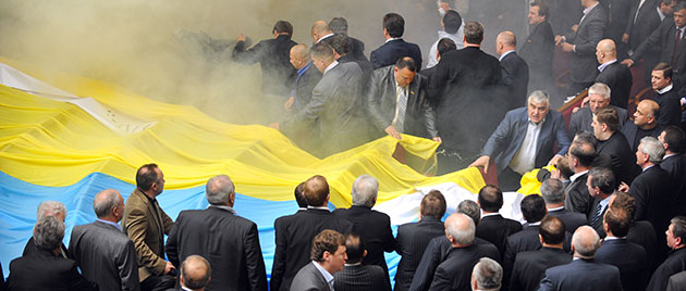 Ukraine parliament: Deputies of Ukraine's parliament fight during a parliament sitting in Kiev