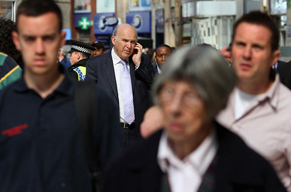 Election campaign: Vince Cable at Waterloo station in London before boarding a train