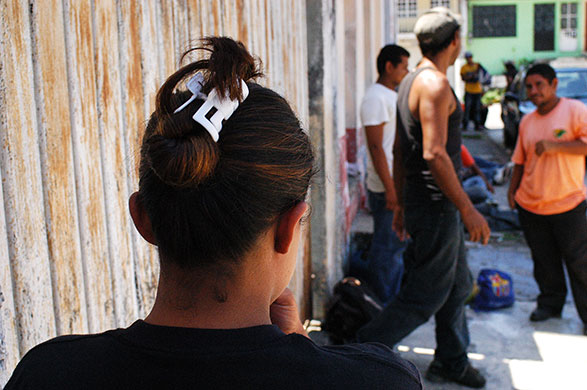 migrants in mexico: Young woman at a shelter for migrants in mexico