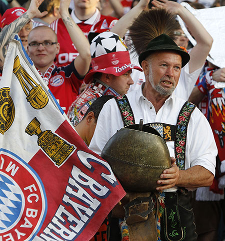 Lyon v Bayern Munich: Bayern Munich fan in traditional costume